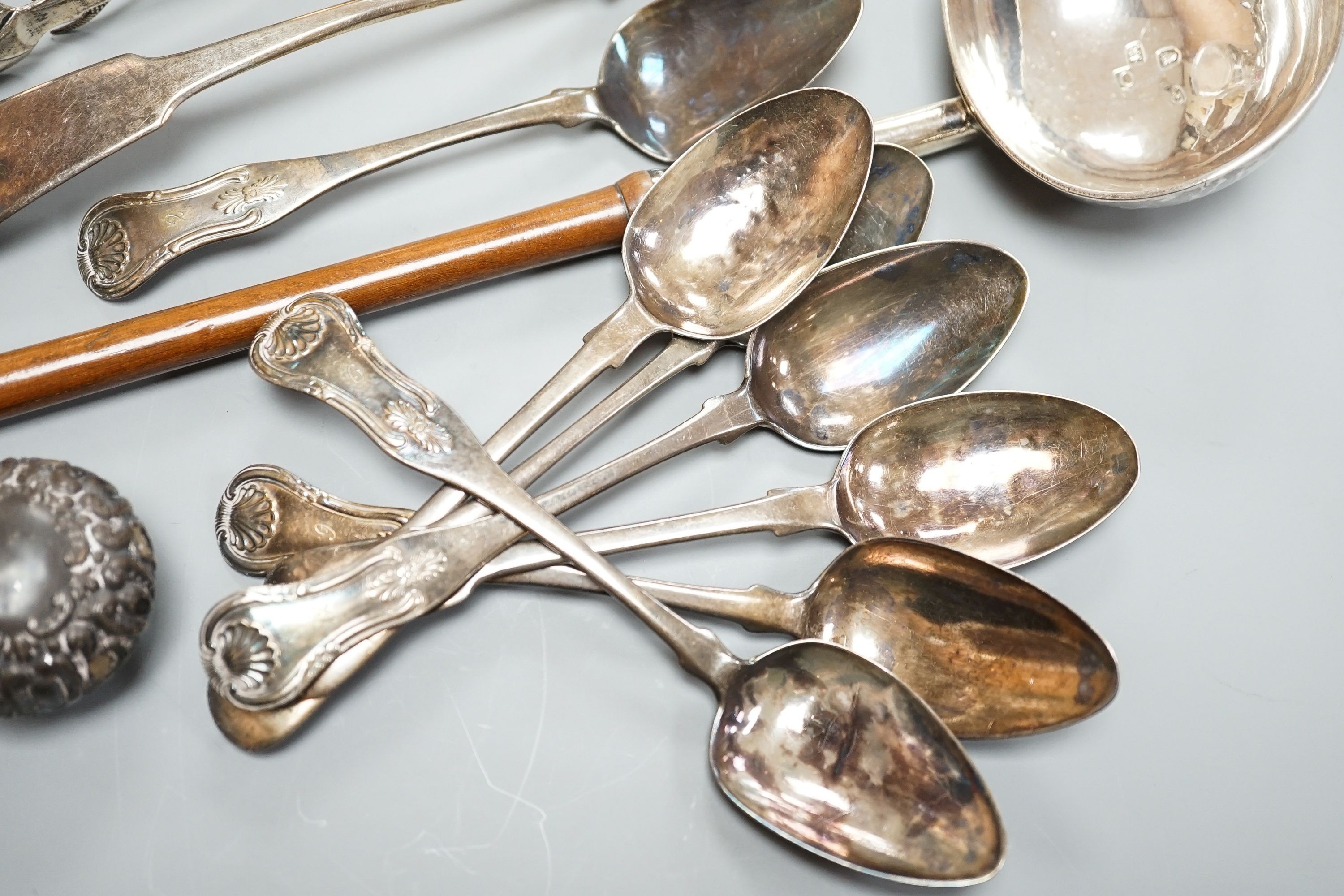 An 18th century silver toddy ladle, with wooden handle(a.f.) and a group of small silver including flatware, napkin ring, scent bottle, repousse box and cover and purse.